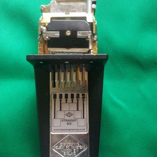Straight six coin machine